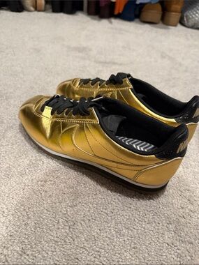 Nike Women's Metallic Gold and Black Cortez Sneakers